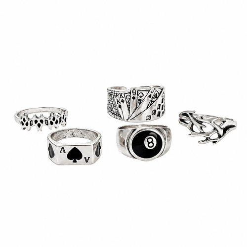 Set of five silver rings with various designs on a white background